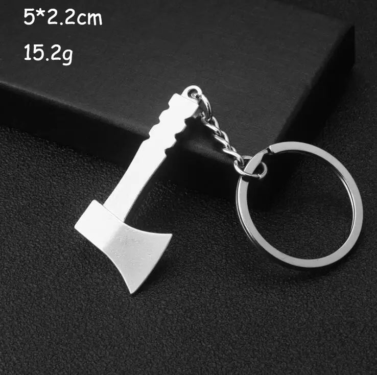 Silver-colored metal axe-shaped keychain with chain and ring part of mini tool keychain set metal multi-tool key ring.