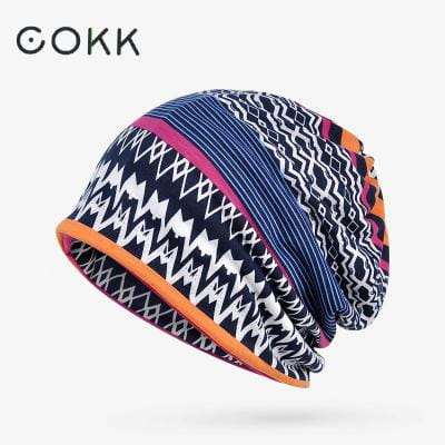 Cokk brand floral knit beanie hat unisex casual autumn headwear featuring a vibrant geometric pattern in navy white pink and orange stripes.