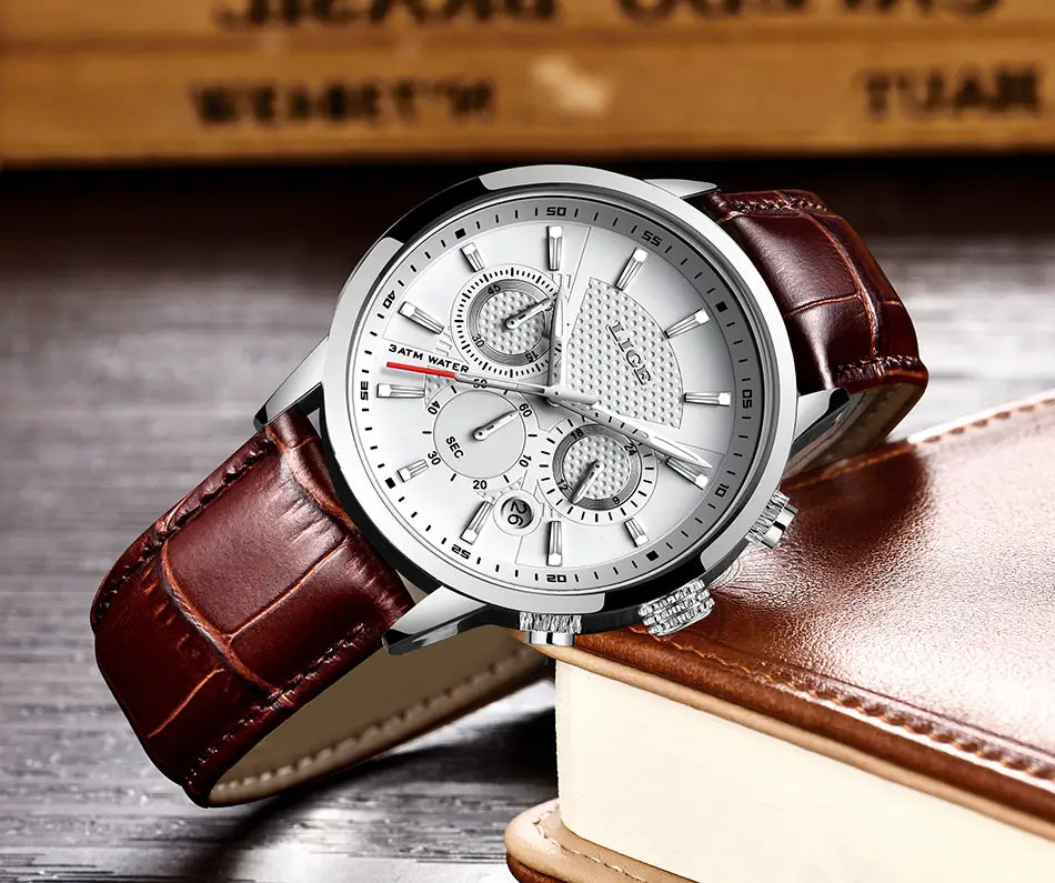 Silver-toned Lige men’s leather chronograph quartz watch with a white dial, three sub-dials, and a brown alligator-textured leather strap.