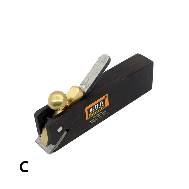 Black wooden hand plane with brass knobs silver blade and orange label on its side from the wood hand planes set ebony woodworking tools