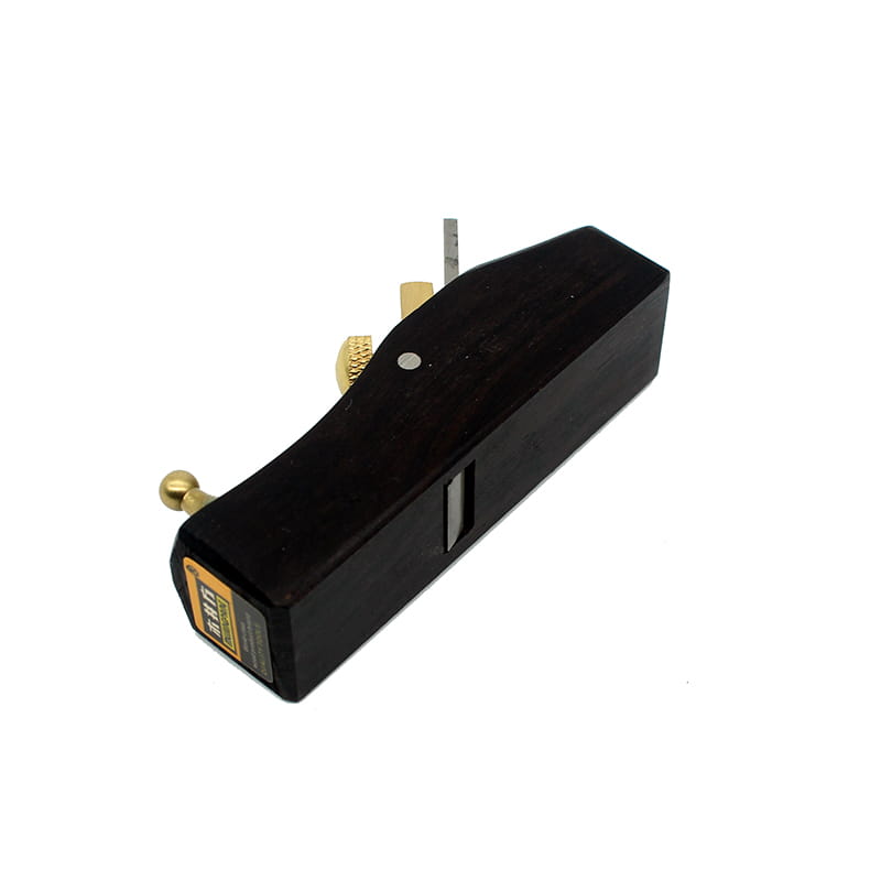 Black wooden hand plane with brass knobs and a metal blade from the wood hand planes set for precision woodworking.