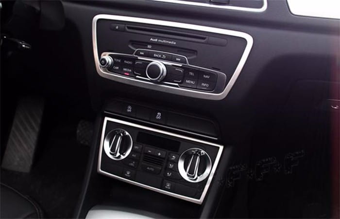 Black Audi Q3 2012-2016 multimedia center with silver trim and circular control knobs interior trim decoration set.