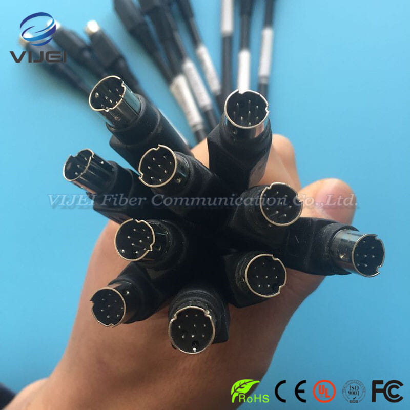 Black d-sub battery charger cable with metallic contacts held in hand against blue background for charger cable adapted optical fiber fusion applications