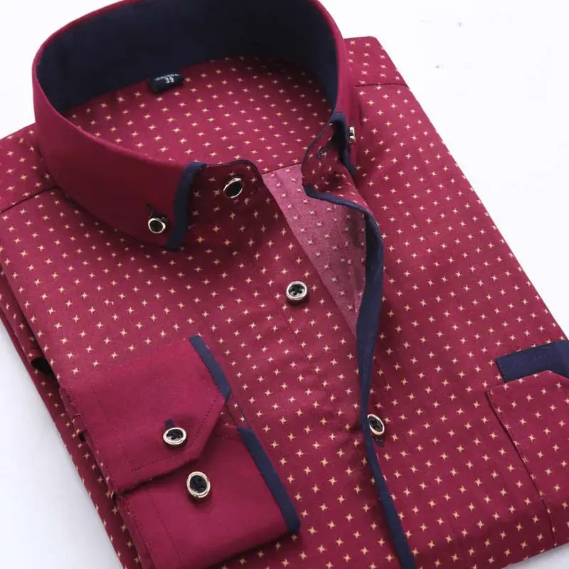 A maroon slim fit long sleeve men floral dress shirt with a subtle white dot pattern and navy blue contrast trim on the collar placket and cuffs for casual wear.