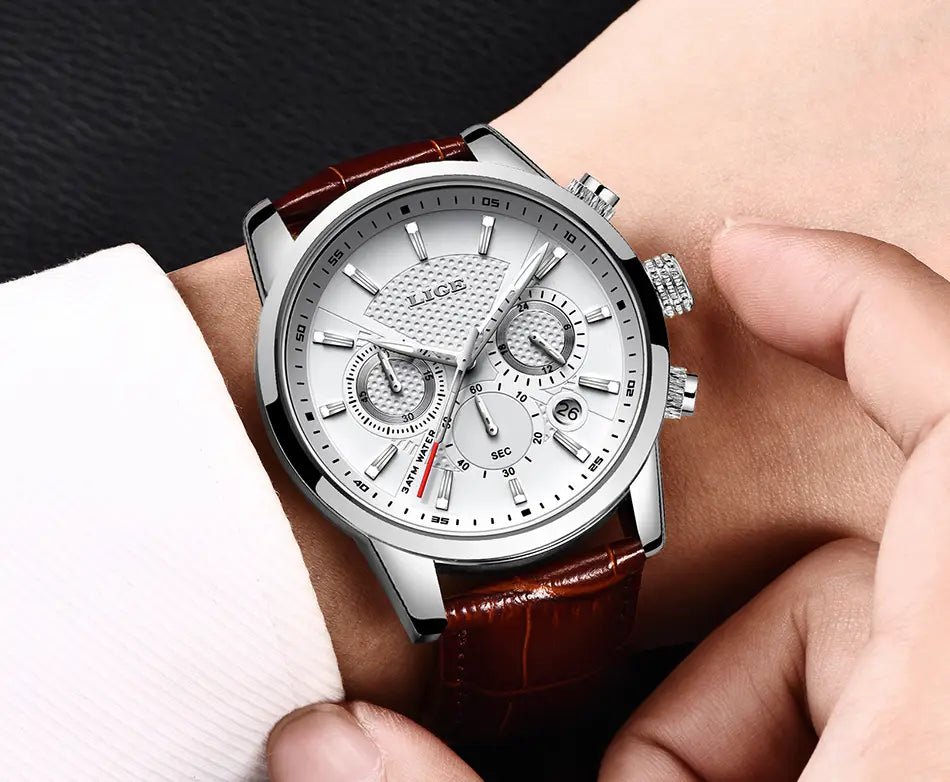 Lige men’s leather chronograph quartz watch with a silver case, white dial featuring three subdials, and a brown leather strap.