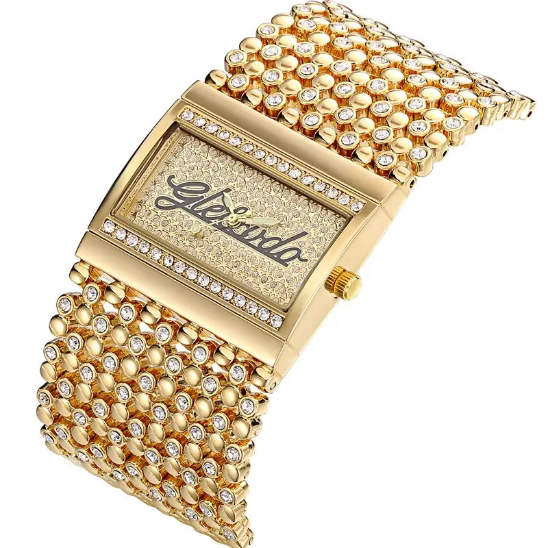Gold quartz women watch with a gold-toned rectangular face and a beaded crystal-encrusted band featuring the gleason logo.