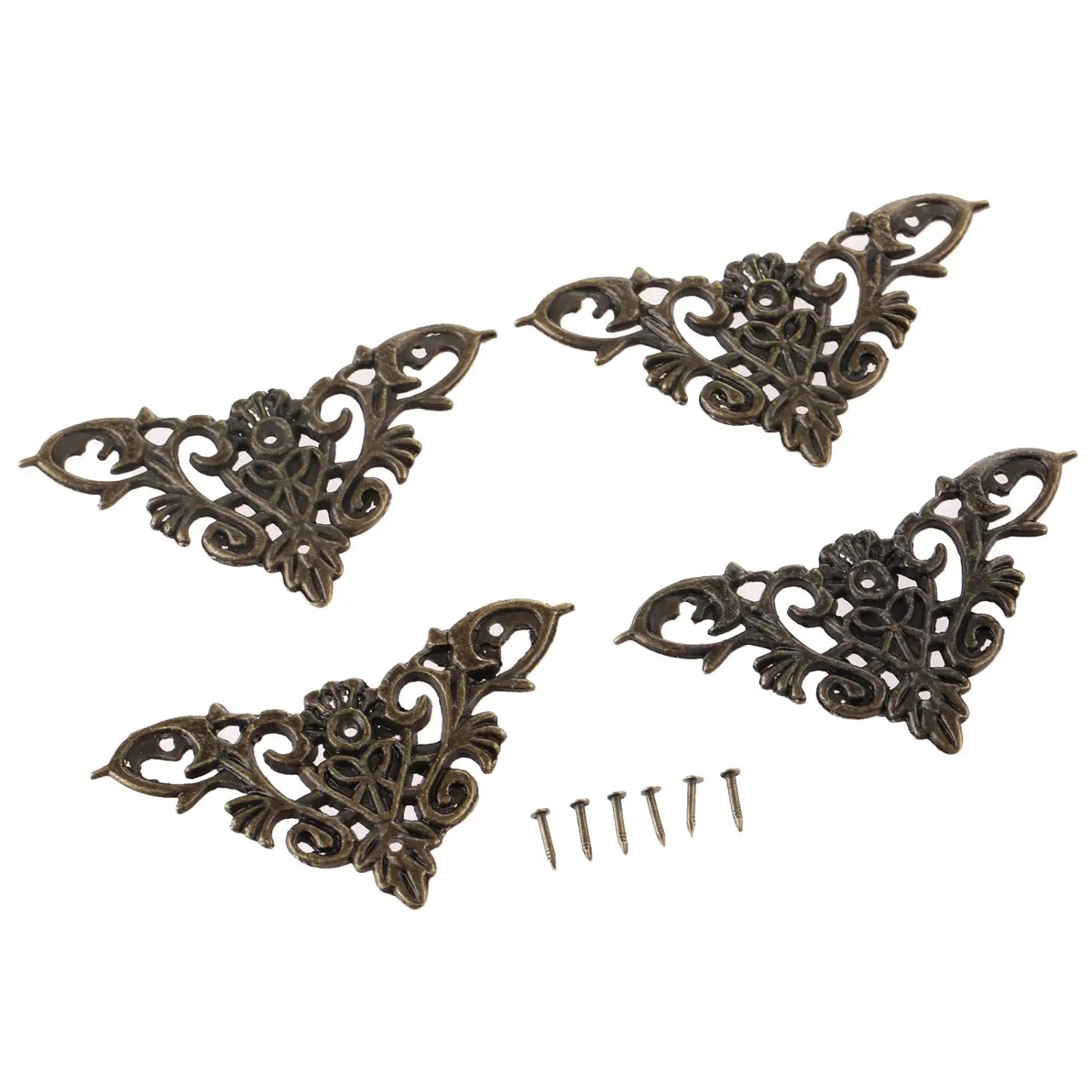 Antique bronze-colored zinc alloy corner protectors with intricate floral and scrollwork designs in a 4-pack set for decorative edge covering.