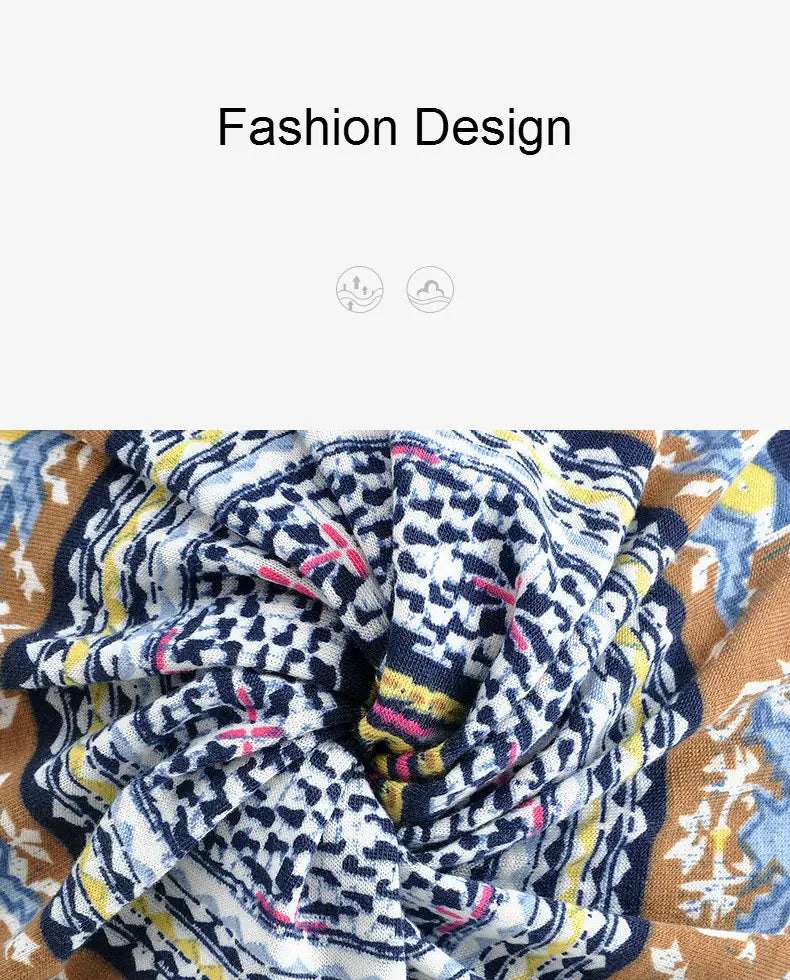 A floral knit beanie hat in navy blue white and yellow with a textured fabric design suitable for unisex casual autumn headwear.