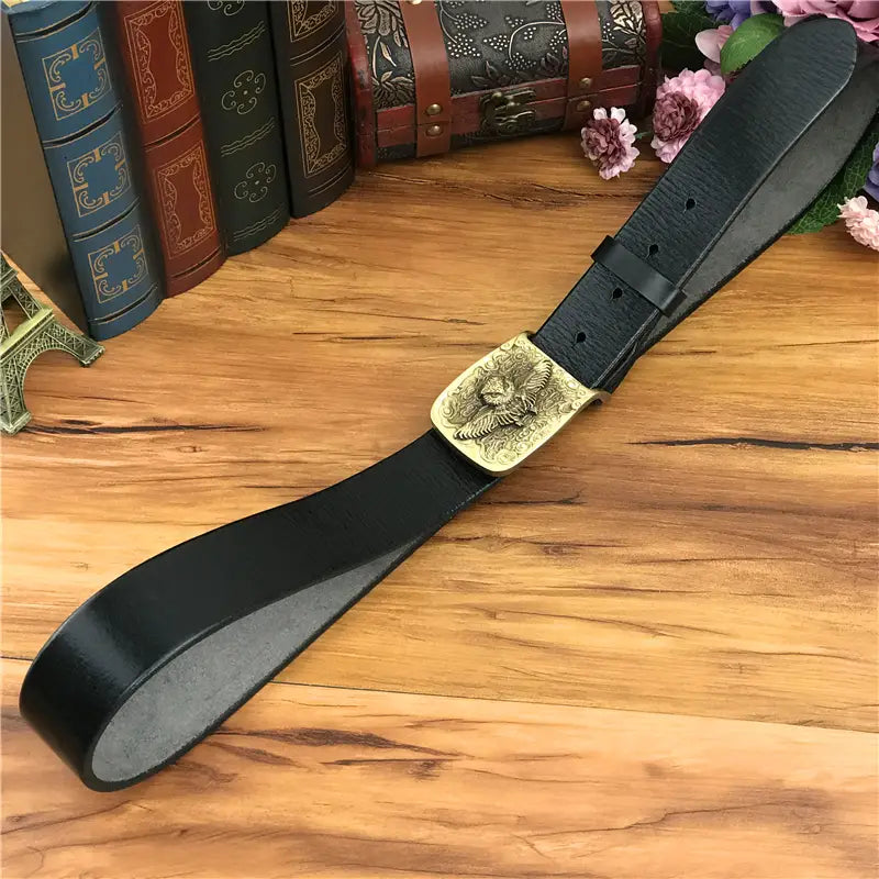 Black leather men jeans belt with a gold-toned eagle engraved brass owl belt buckle