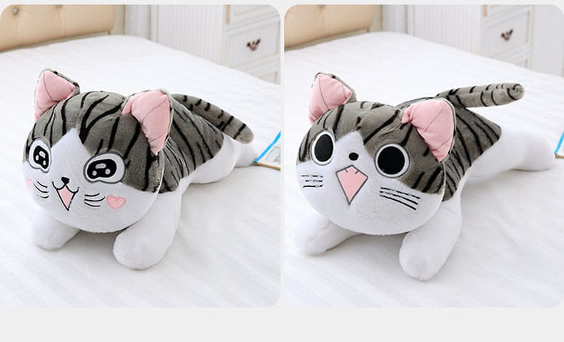 cute gray and white striped cheese cat soft animal plush toy with pink inner ears nose and cheeks designed as a soft animal doll