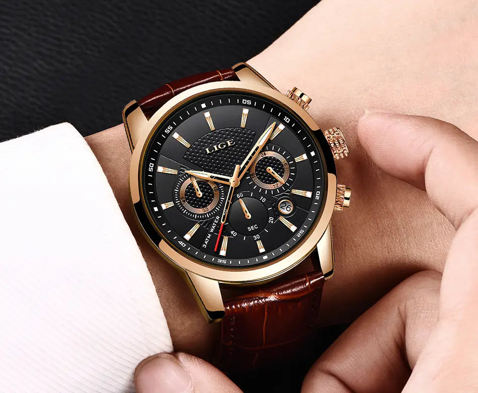 Lige men’s leather chronograph quartz watch featuring a gold-tone case, black dial with three subdials, and a brown leather strap.