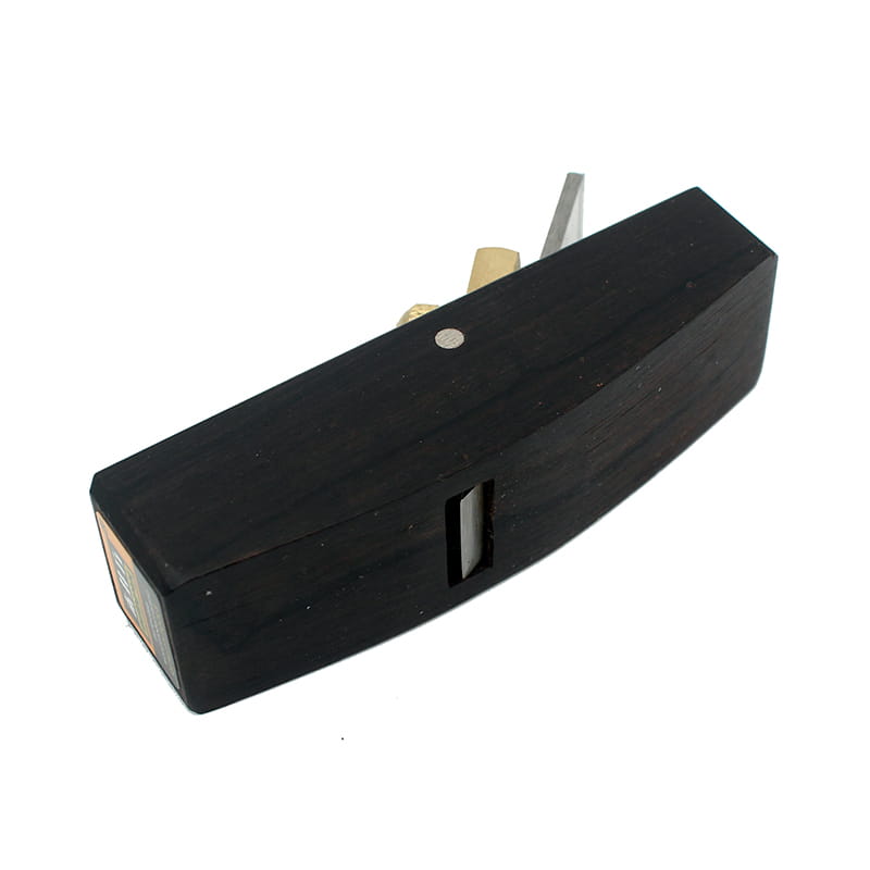 Black wooden block plane with metallic blade and brass adjustment components from a wood hand planes set for woodworking.