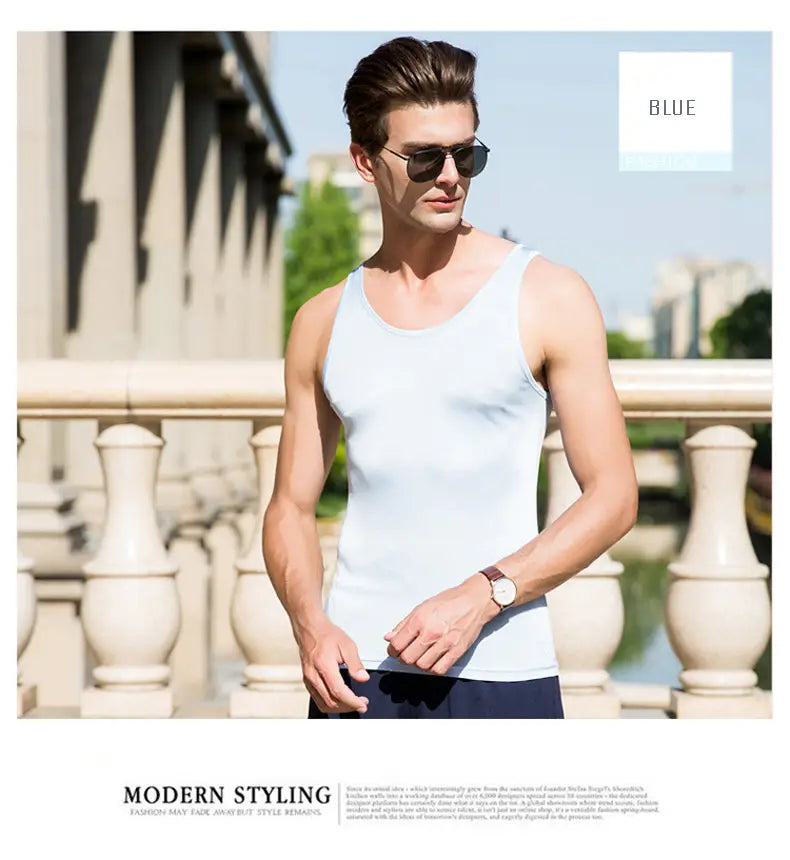 Light blue sleeveless men silk blend tank top o neck vest for casual wear.