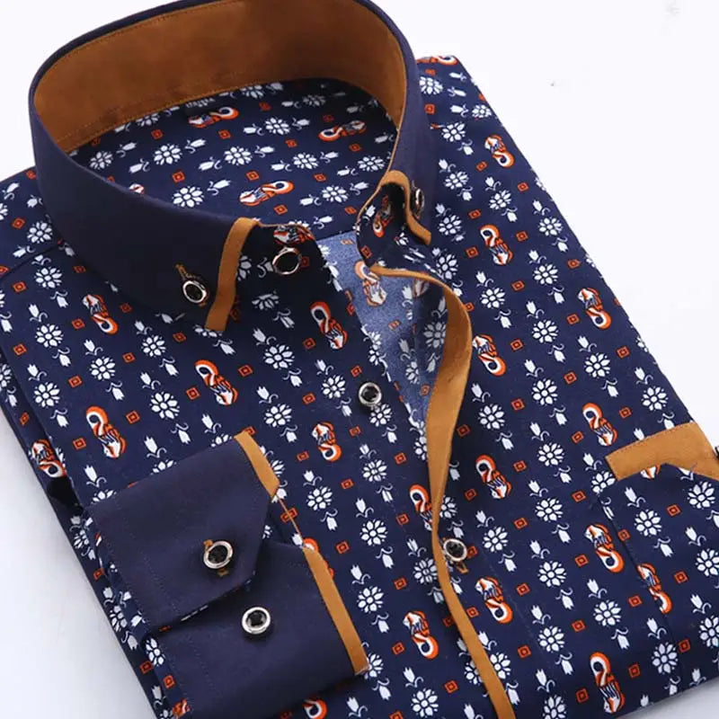 Men floral dress shirt slim fit long sleeve casual in navy blue button-down style with white and orange paisley floral pattern and tan leather trim on collar and cuffs.