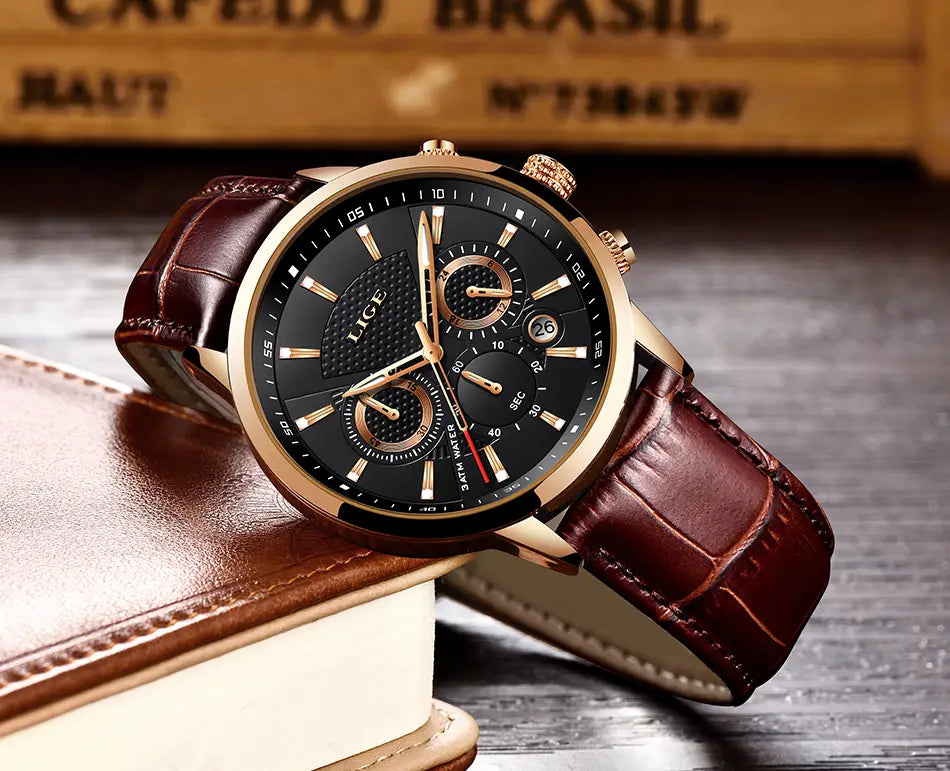 Lige men’s leather chronograph quartz watch with a black dial, three subdials, gold-tone case, and brown leather strap.
