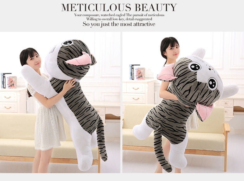 Cheese Cat soft animal plush toy featuring a plush tiger design with black and white striped fur, pink inner ears and nose, and oversized cartoon eyes, perfect among soft animal dolls.