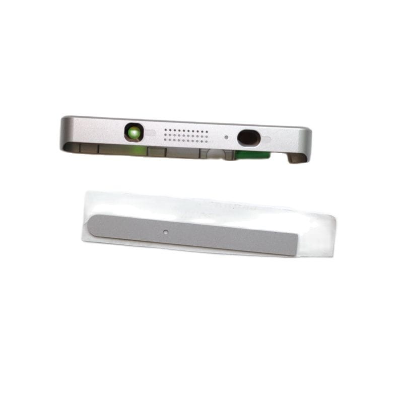 Silver metallic blackberry keyone dtek70 replacement battery cover housing back side with green camera lens and speaker grille shown with transparent protective film.