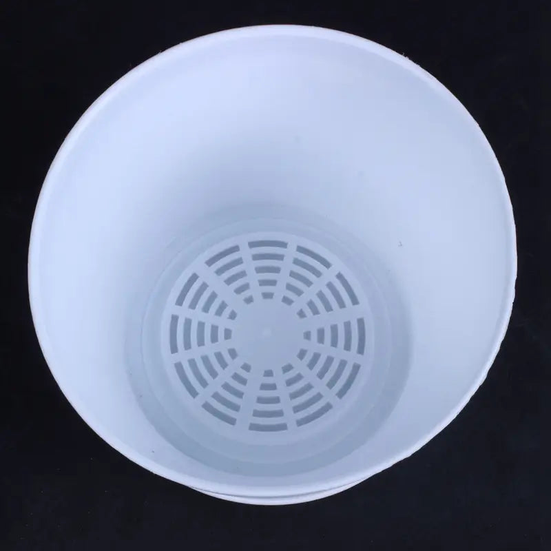 White plastic plant pot with saucer 17cm featuring a circular drainage hole pattern for efficient water flow ideal for wholesale drop shipping order fulfillment.