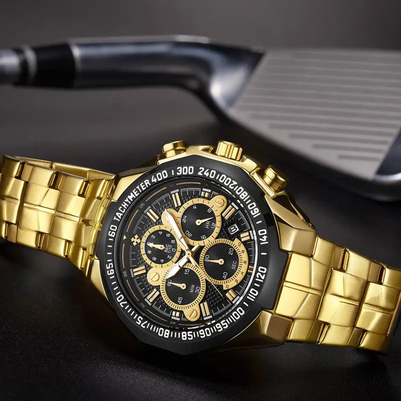 Gold-tone stainless steel chronograph watch for men featuring a black dial with three subdials and gold-colored hands and markers.