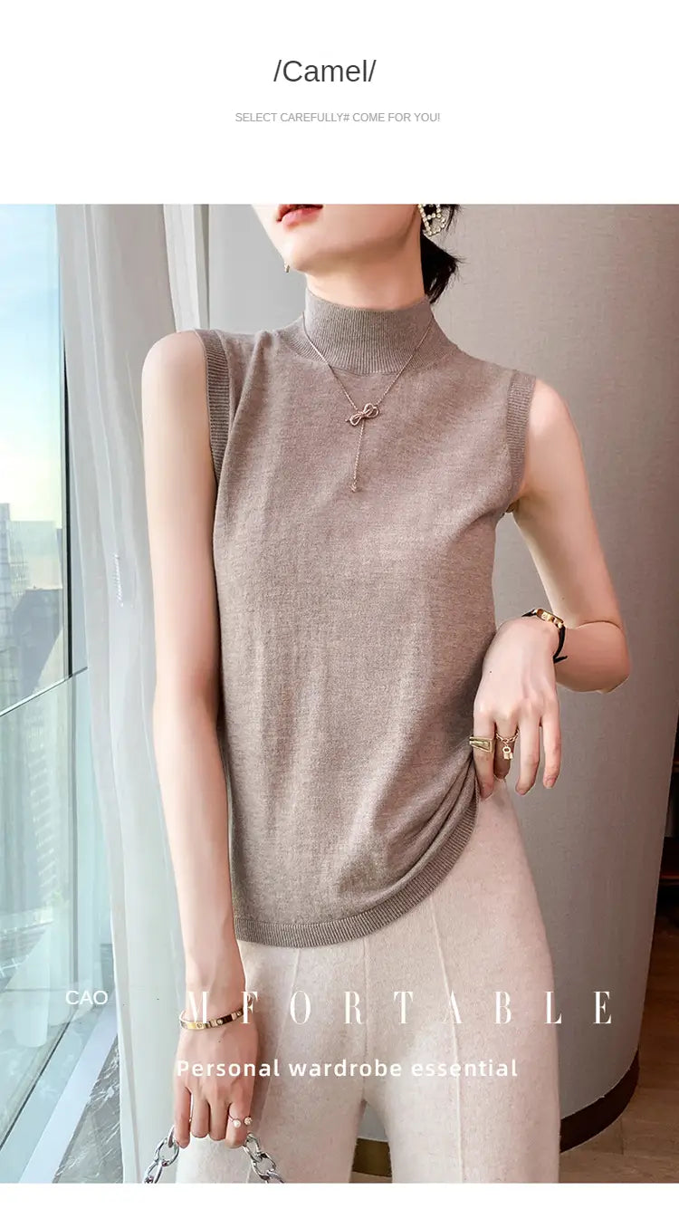 A soft camel-colored wool turtleneck sleeveless sweater vest with a high neckline and subtle ribbed texture.
