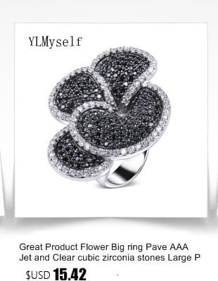 Black and white crystal statement flower ring featuring black and clear cubic zirconia with an intricate pave petal design.