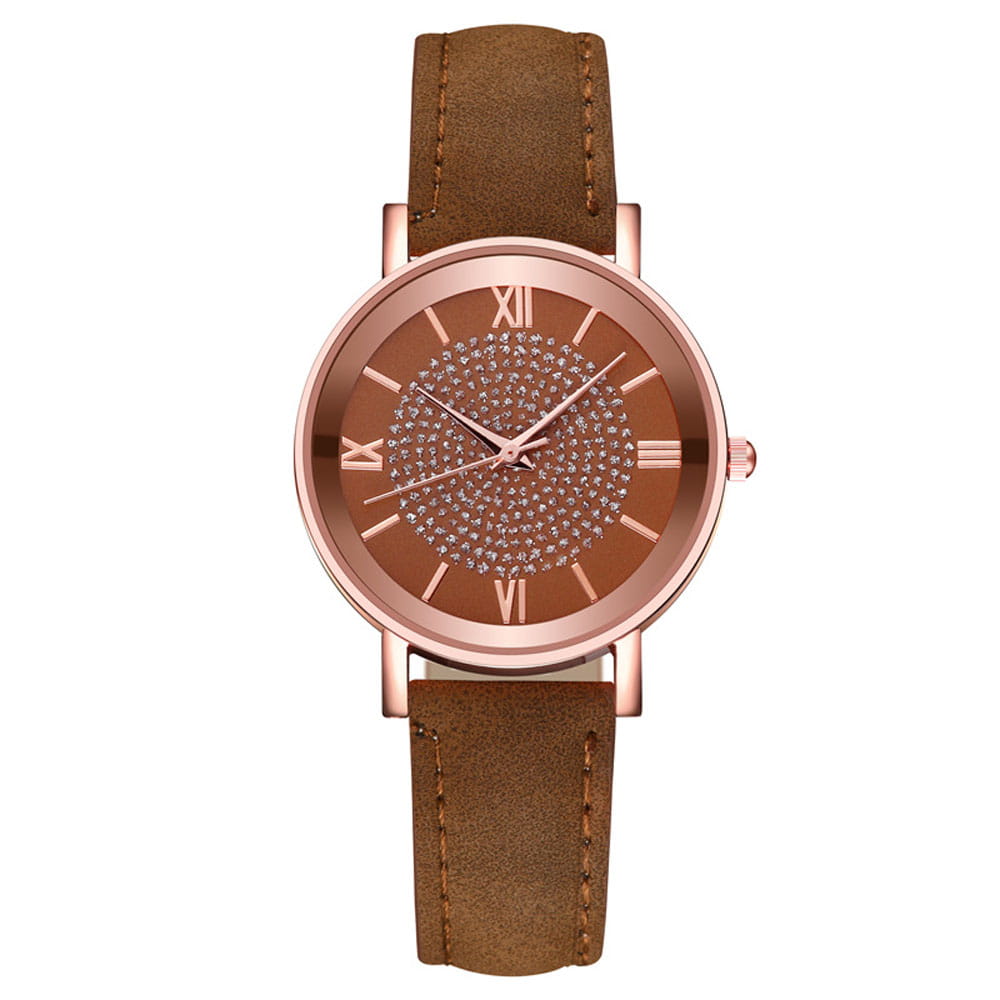 Rose gold crystal quartz women watch with a brown leather strap and a face adorned with sparkling crystals.