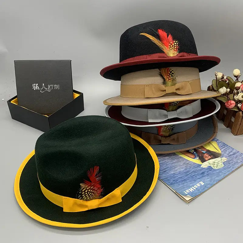 Unisex woolen felt fedora hat in dark green with a bright yellow ribbon band and a red and white feather accent.