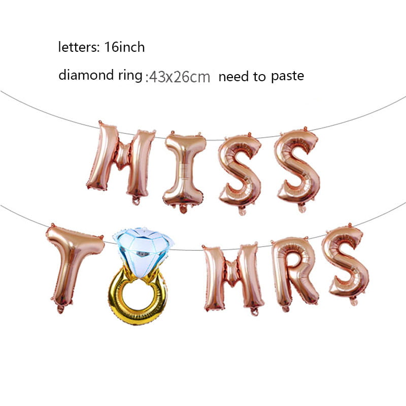 Bride to be foil balloon banner set featuring rose gold foil balloons spelling miss to mrs with a central inflatable diamond ring design.