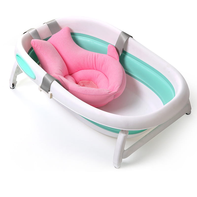 Foldable newborn bath mat and cushion featuring a pink plush baby bath support with mesh insert nestled in a white and teal foldable bathtub.