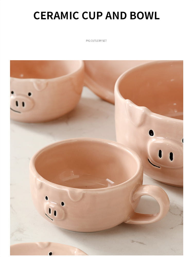 Pastel pink ceramic cup and bowl set featuring cute pig faces with black dot eyes snouts and ears in the cute pig ceramic dinnerware set.
