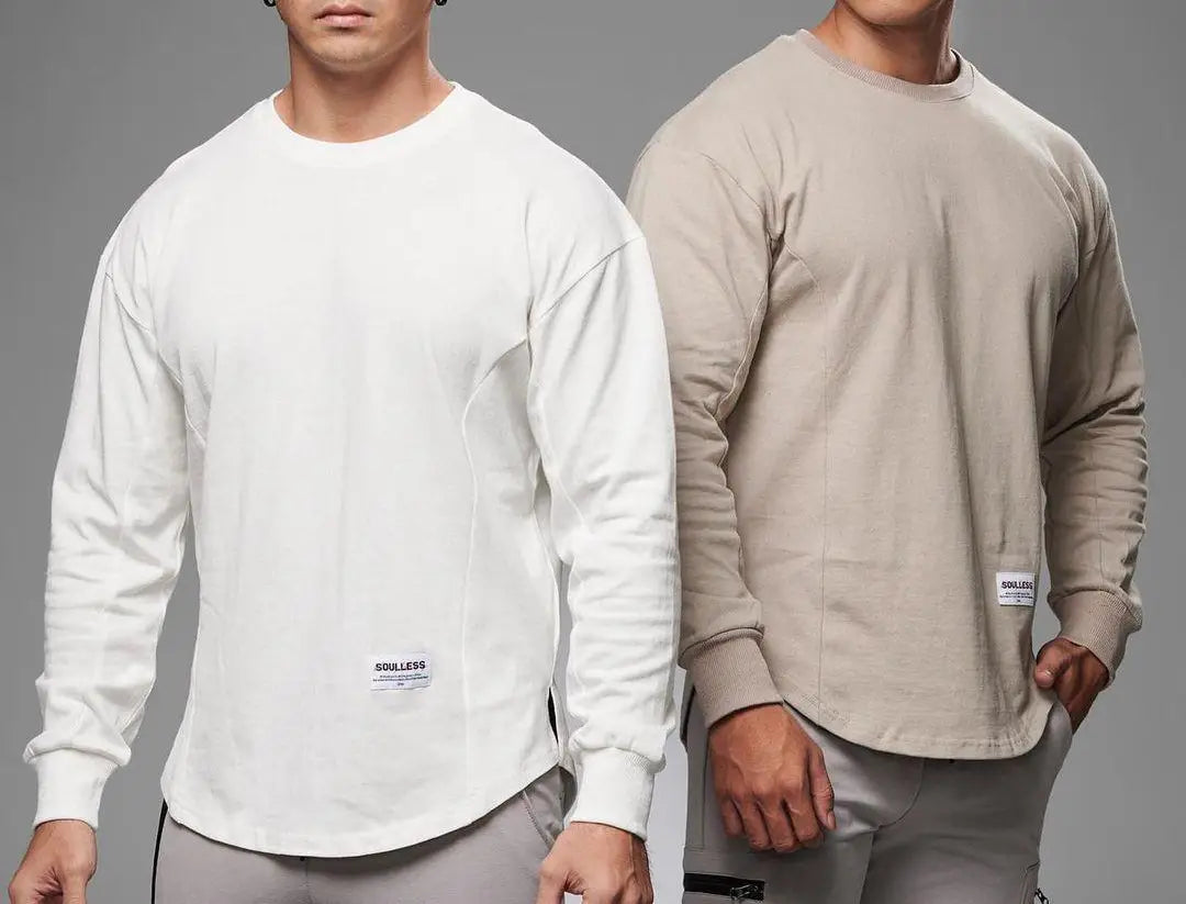 Men long sleeve cotton t shirt curved hem in white and beige with subtle side seam detailing and branded patch labels.