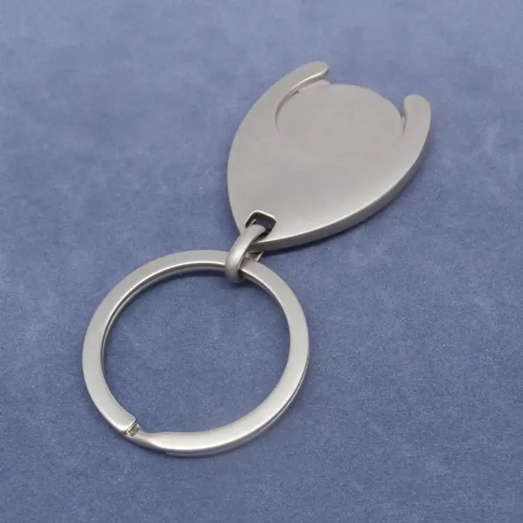 Silver metallic custom engraved metal keychain with a sleek oval-shaped tag featuring an open-top design and a sturdy circular ring.