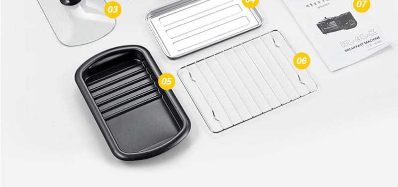 Black non-stick baking pan with ribbed interior and rounded edges for 3 in 1 breakfast station coffee maker and toaster oven.