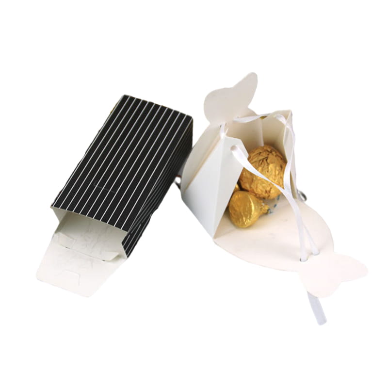 white paper bride and groom wedding favor candy boxes with butterfly-shaped flaps and matching ribbon ties in white and black-and-white striped designs for 30 pieces.
