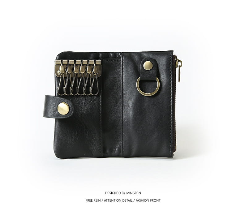 Black leather key chain wallet for men featuring brass-colored metal hooks and a zipper closure.