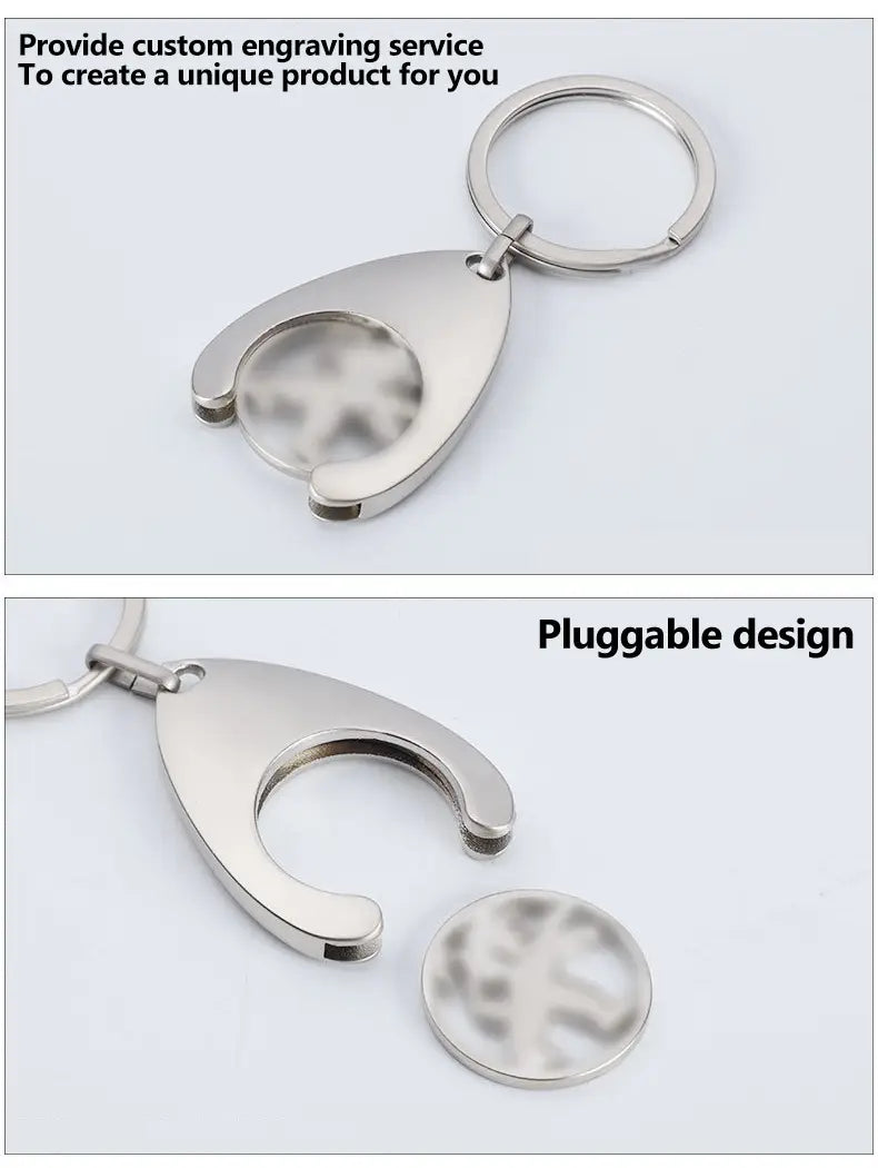 Silver metallic custom engraved metal keychain with a teardrop-shaped body and a circular insert that snaps into place featuring an engraved design on its surface.