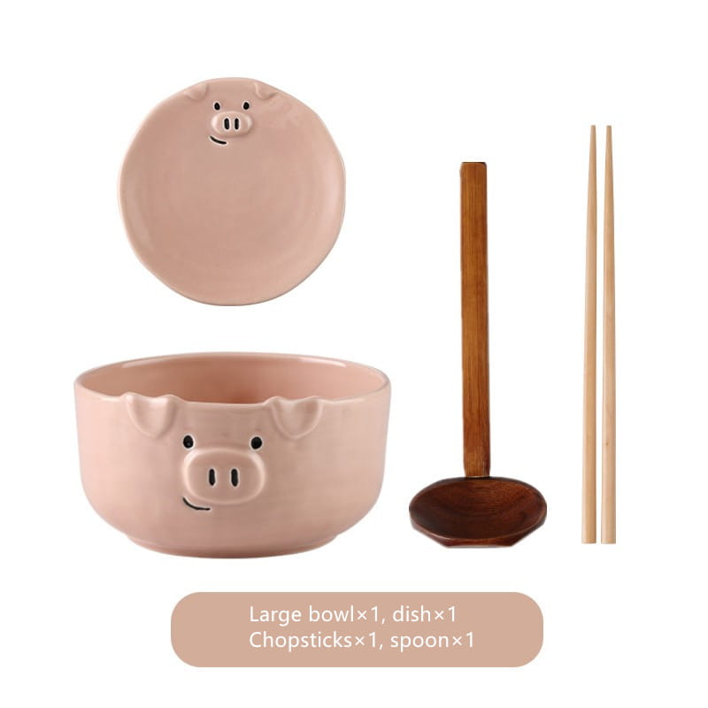 Pink ceramic pig-shaped bowl with matching lid and wooden spoon from the cute pig ceramic dinnerware set.