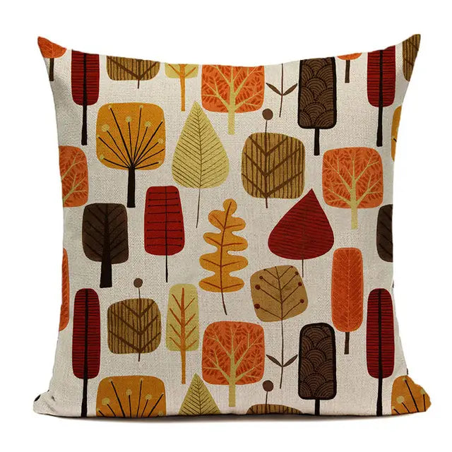 square cushion cover 45x45cm with a retro-style pattern of stylized autumn leaves and trees in orange red brown and beige on a light cream faux linen background for sofa use