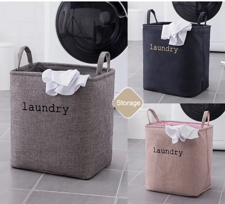 Foldable laundry basket fabric storage box made of gray fabric with black embroidered laundry text and sturdy handles for convenient storage baskets use.