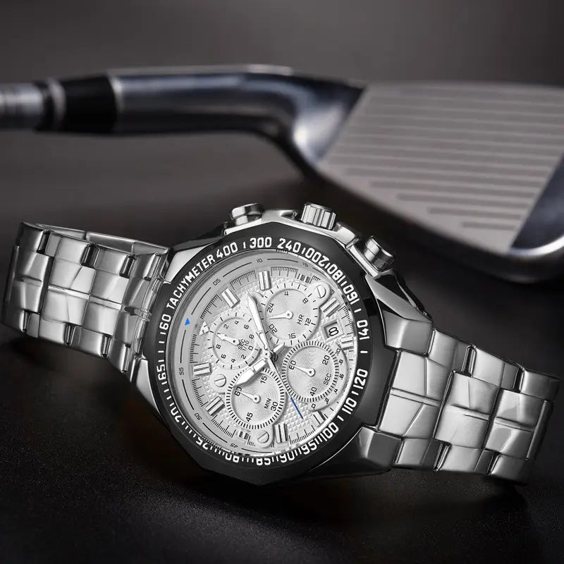 Silver-toned stainless steel chronograph watch with multi-dial face and tachymeter bezel in a gold chronograph watch men stainless steel luxury timepiece.