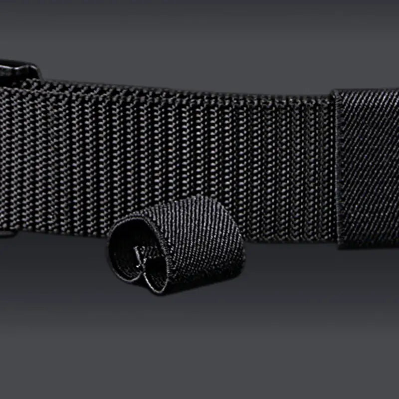 Black woven nylon mens tactical canvas belt strap with a reinforced buckle section and lightweight automatic buckle.