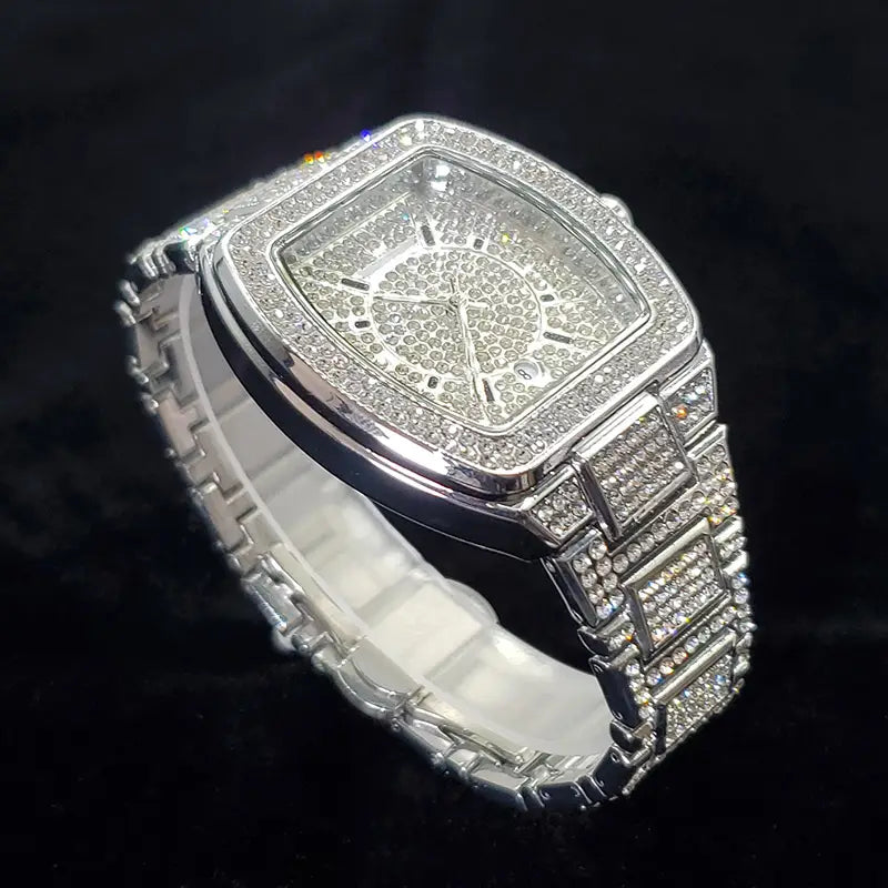 A dazzling silver gold iced out square diamond mens watch luxury quartz with a square face and band fully encrusted in sparkling clear crystals.