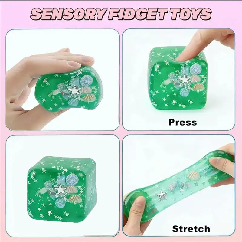 jouet sensoriel de cube sphérique translucide vert à faible rebond, visqueux et lent, avec un coquillage et des breloques en forme d’étoiles intégrés, vu de face
