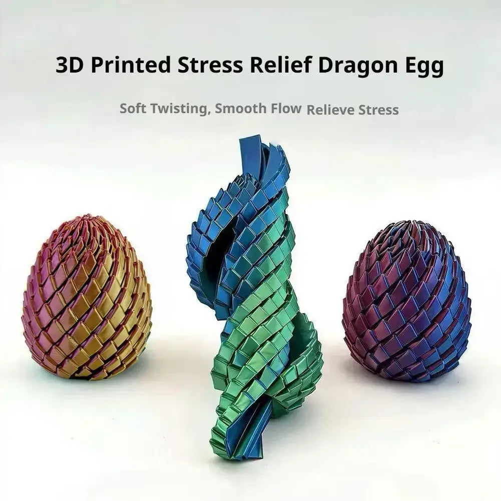 The central 3d printed dragon egg stress toy shows a blue and green gradient with interlocking textured scales