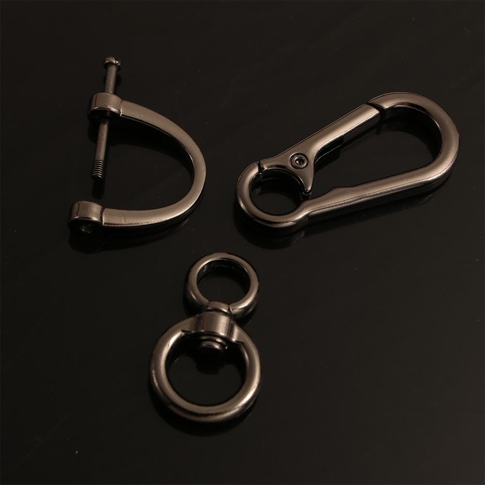 Set of three metallic car key clip carabiner keychains in a sleek dark gray finish designed for secure key attachment.