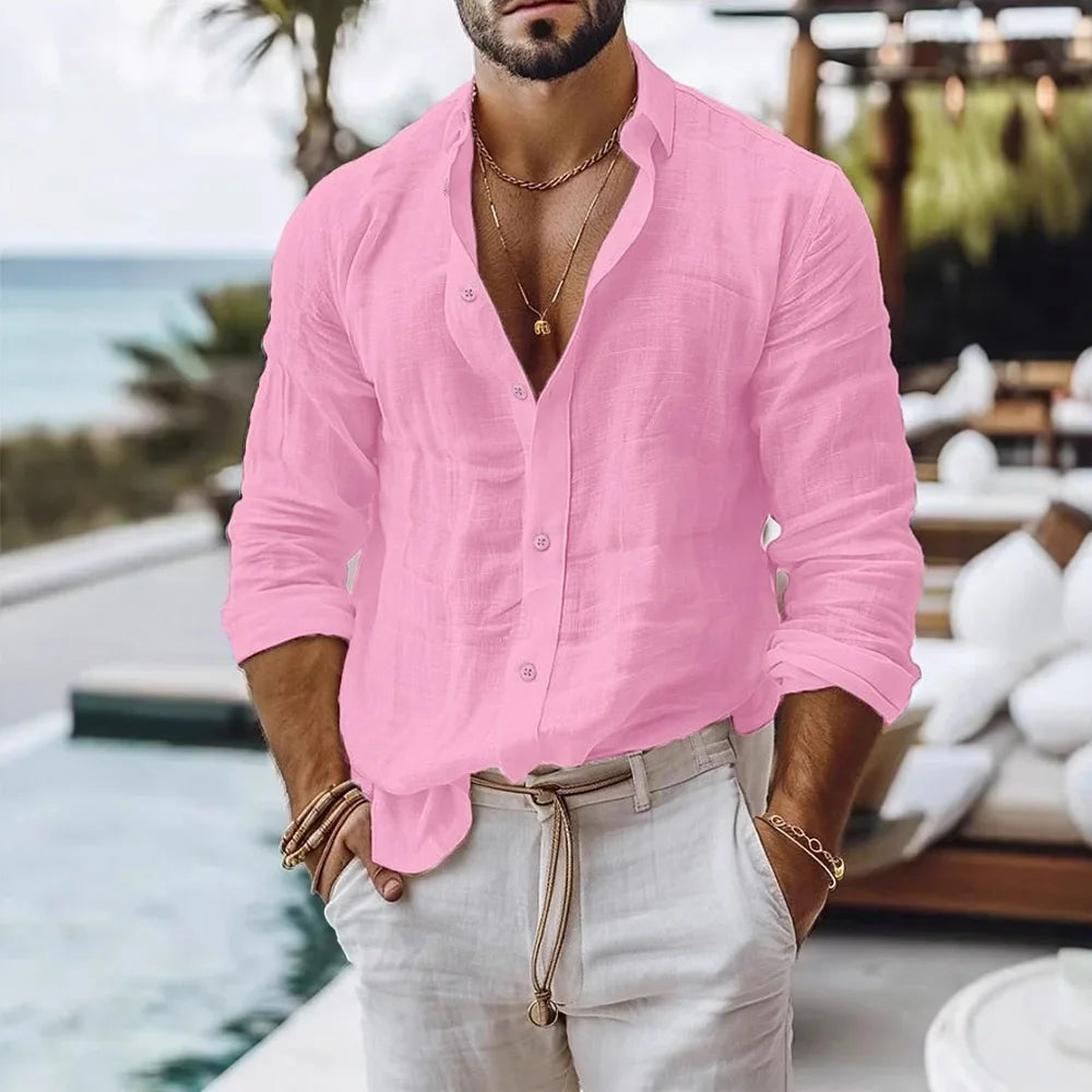 Men’s linen beach shirt in soft pink featuring long sleeves and lightweight fabric for comfortable wear.