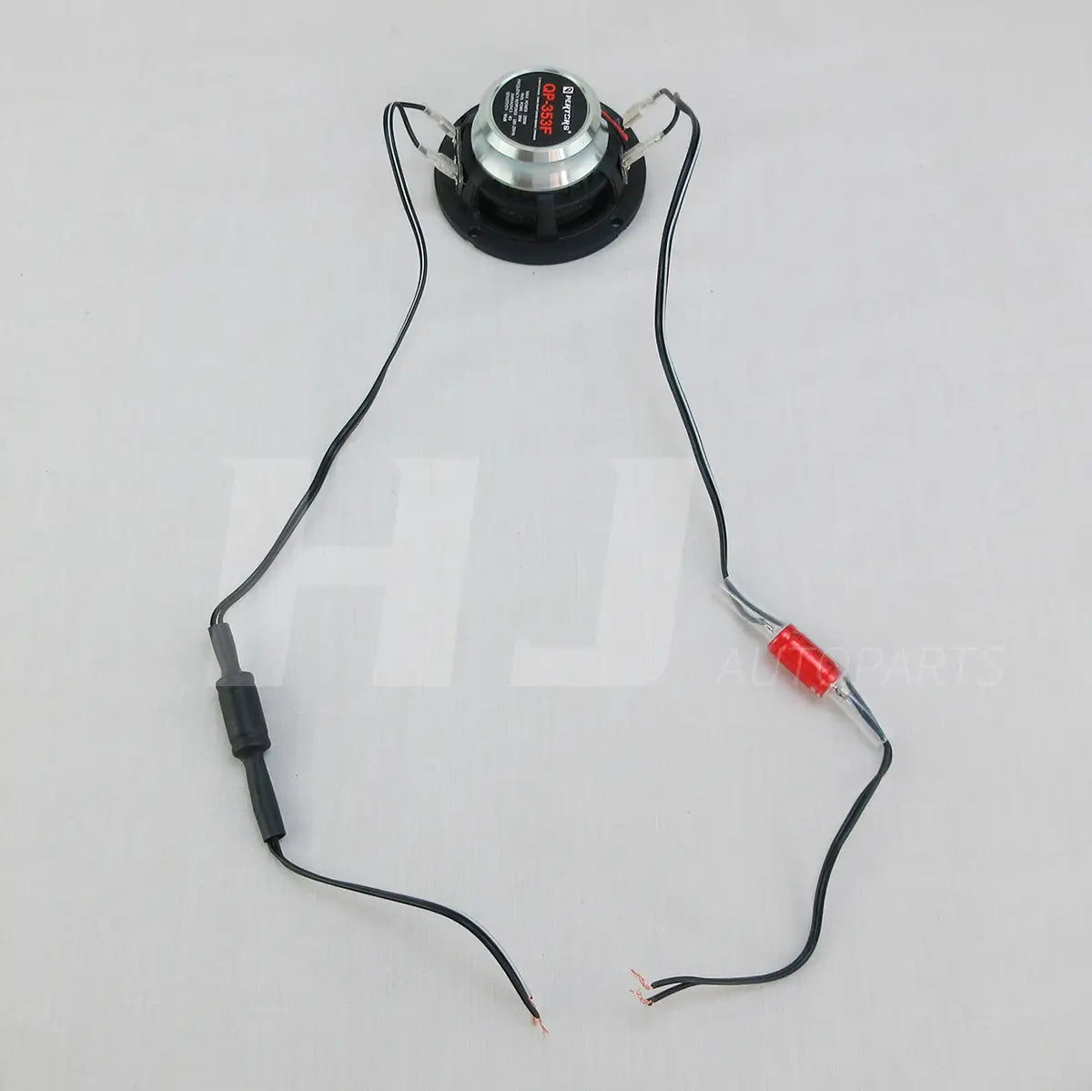 Black and silver 3.5 inch car coaxial speaker with red capacitor and black wiring showing the back side for 200w output model qp353f.