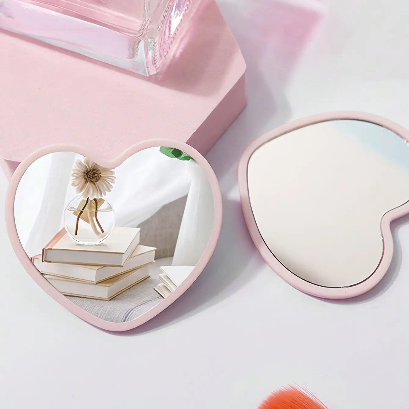 Pink heart-shaped compact mirror with a smooth glossy frame included in a 36pcs 12sets bridal shower favors set with thank you cards and tulle bags for bridesmaid and wedding favors.