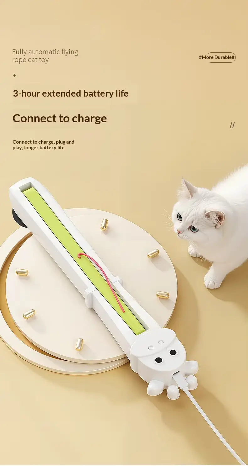 white plastic automatic interactive cat toy mounted on the wall features a green internal mechanism and a cute cartoon face design at the end for engaging play.