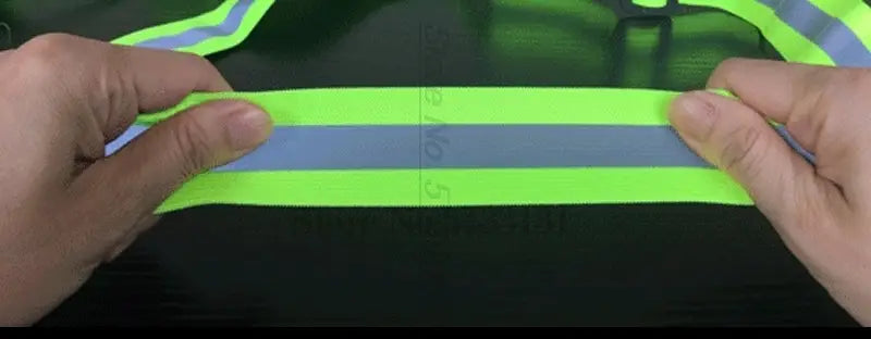 Reflective motorcycle safety vest featuring a bright neon green reflective safety strip with a central gray reflective band.